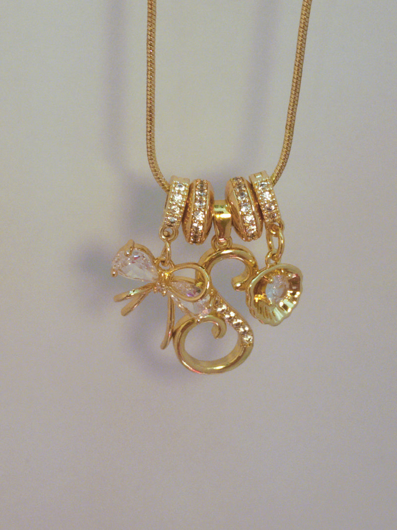 Ribbon & Shell Initial