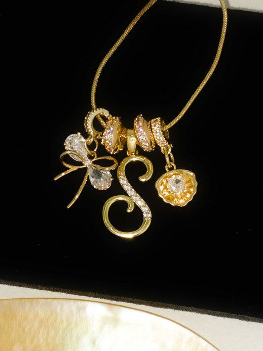 Ribbon & Shell Initial